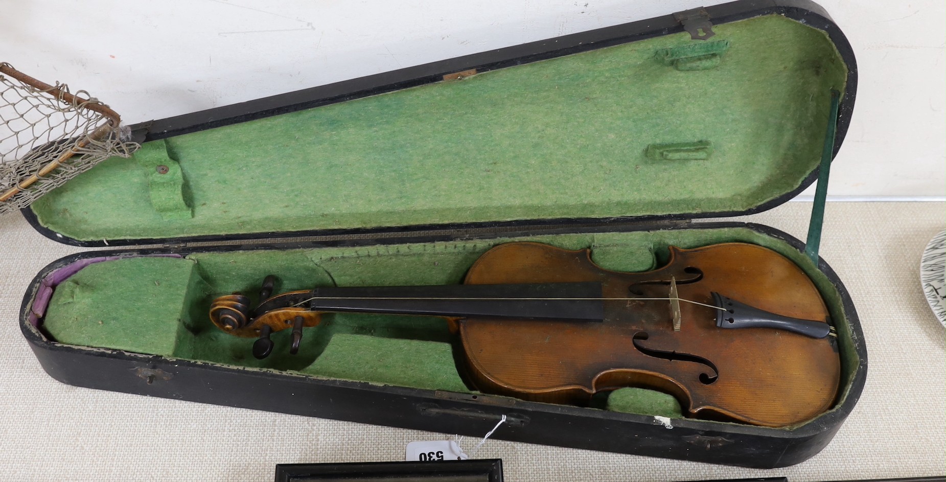 A cased German violin, 60cms long